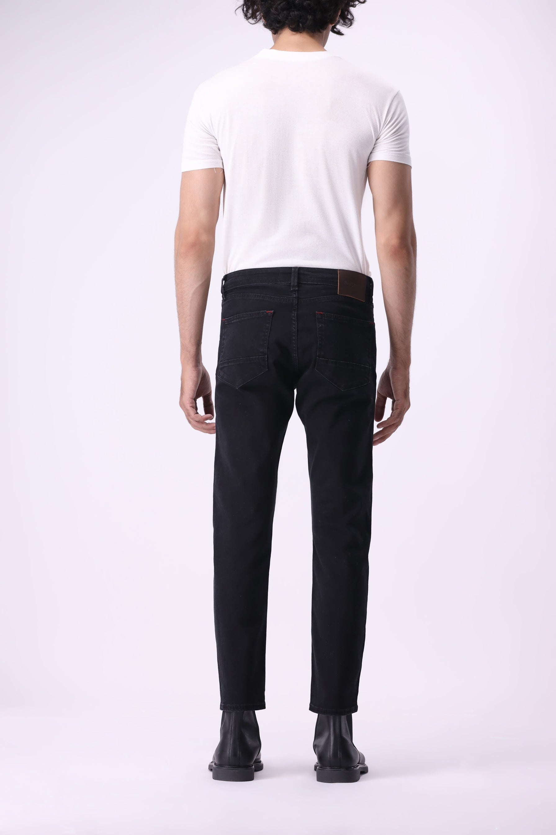 Men’s slim black jeans deep wash back view – Gom sustainable denim