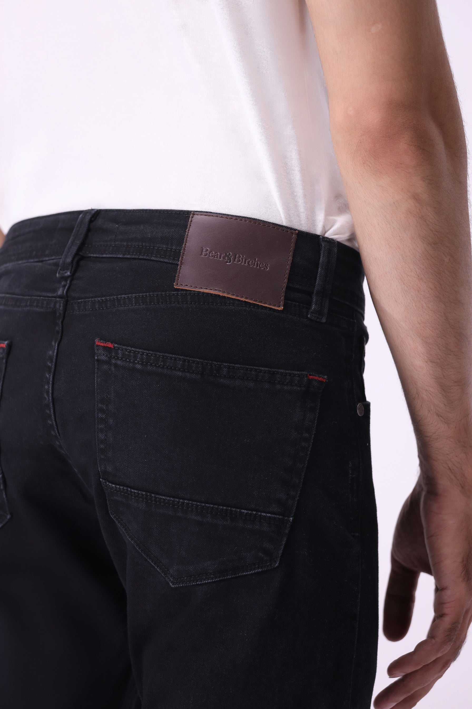 Black sustainable denim detail – Gom men’s slim-fit jeans by Bear & Birches