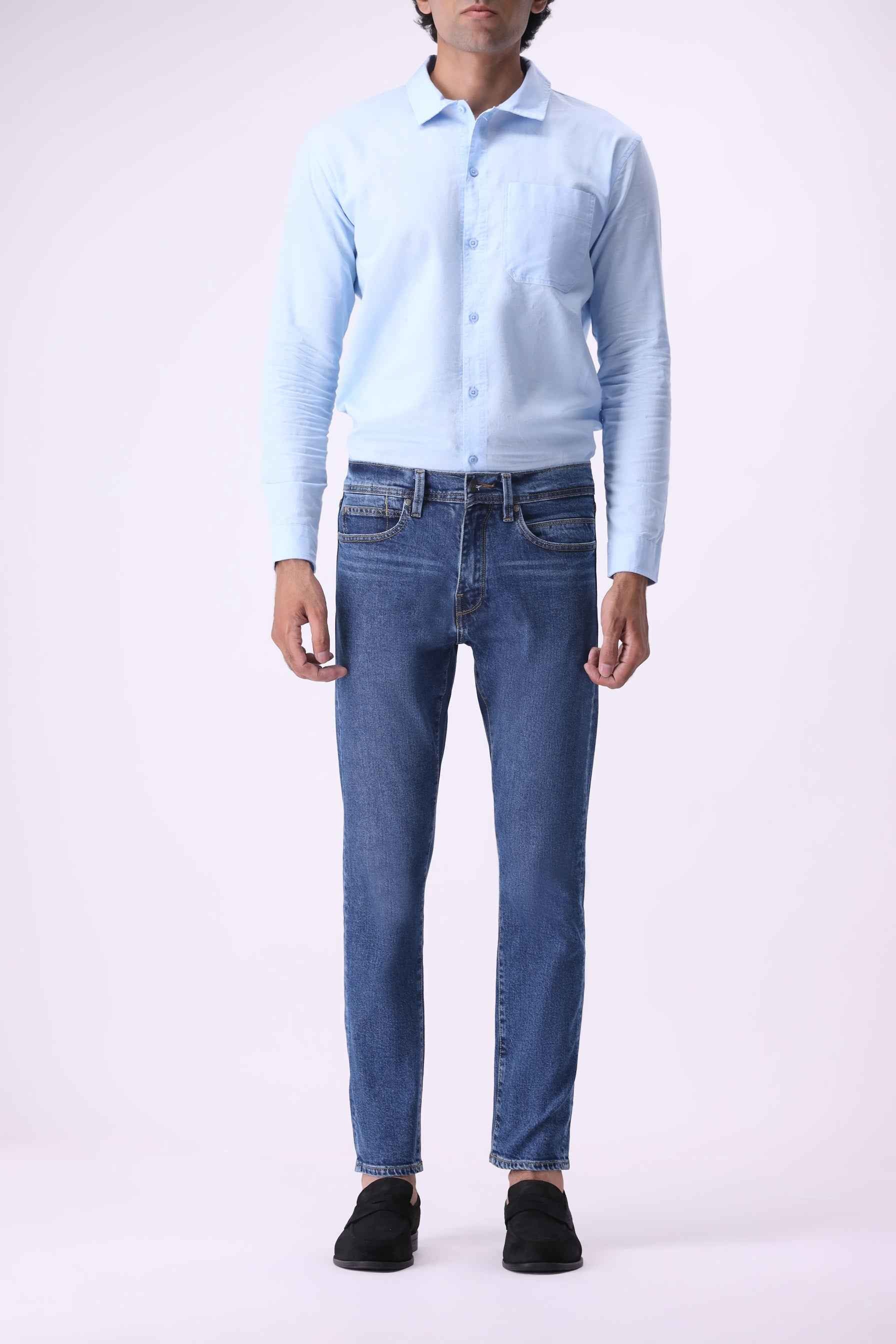 Baloo men's tapered slim jeans in a premium light wash, crafted from 65% organic cotton and 33% Tencel™.