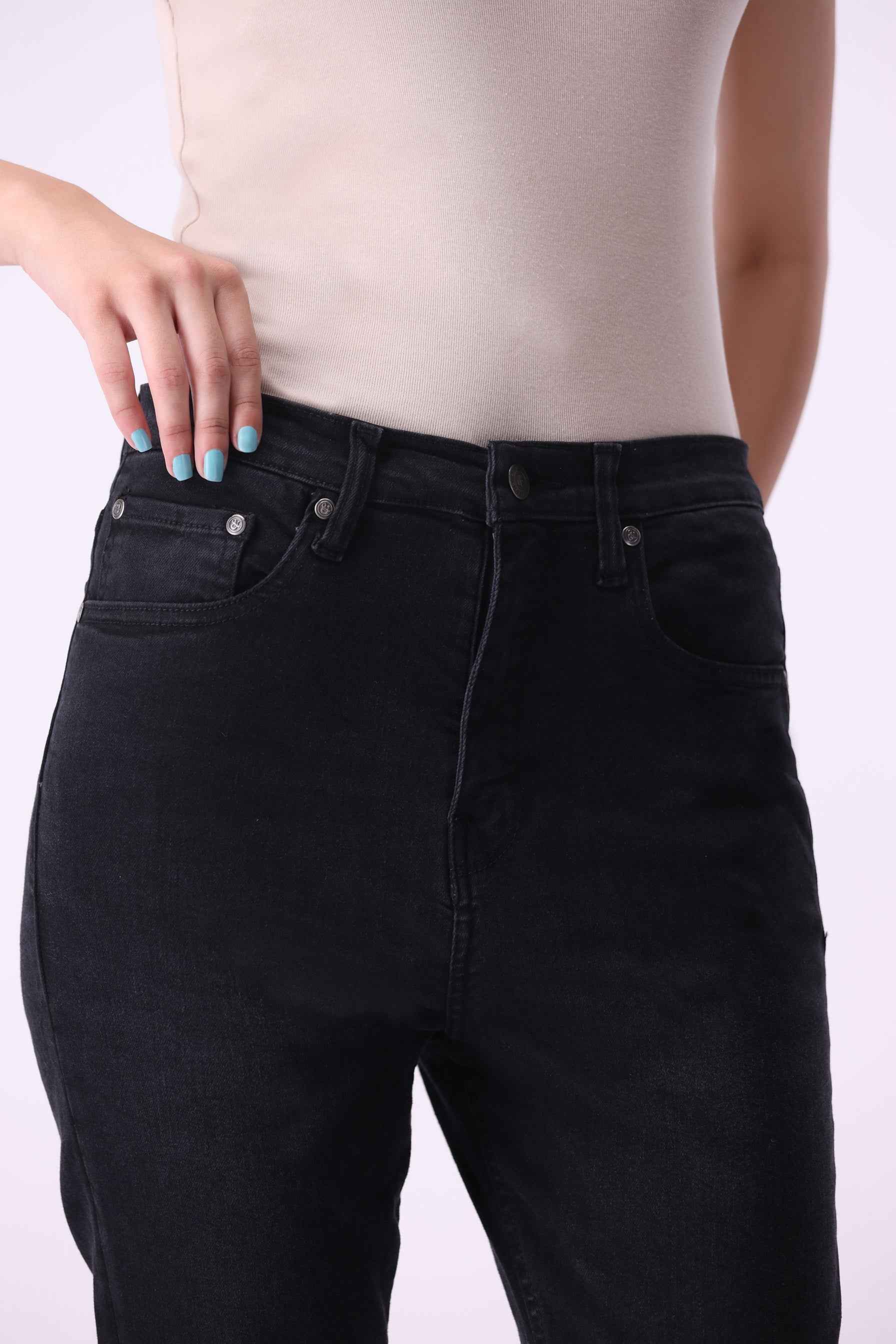 Close-up front view of Beryoza high-rise skinny jeans in a deep Dark Wash, emphasizing the sleek, tailored finish.
