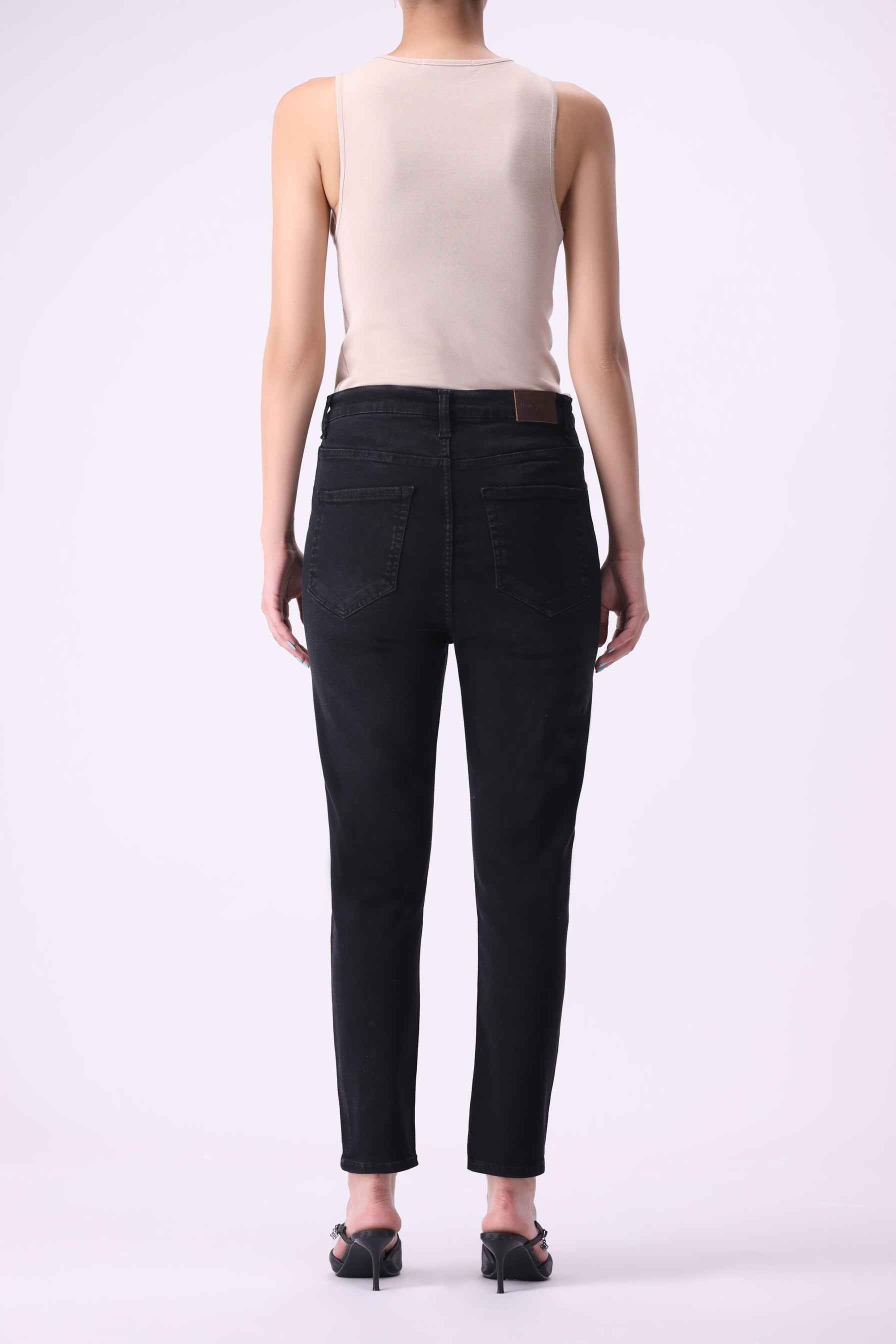 Full back profile of Beryoza high-rise skinny jeans in Dark Wash, highlighting the 44% stretch recovery and elegant silhouette.