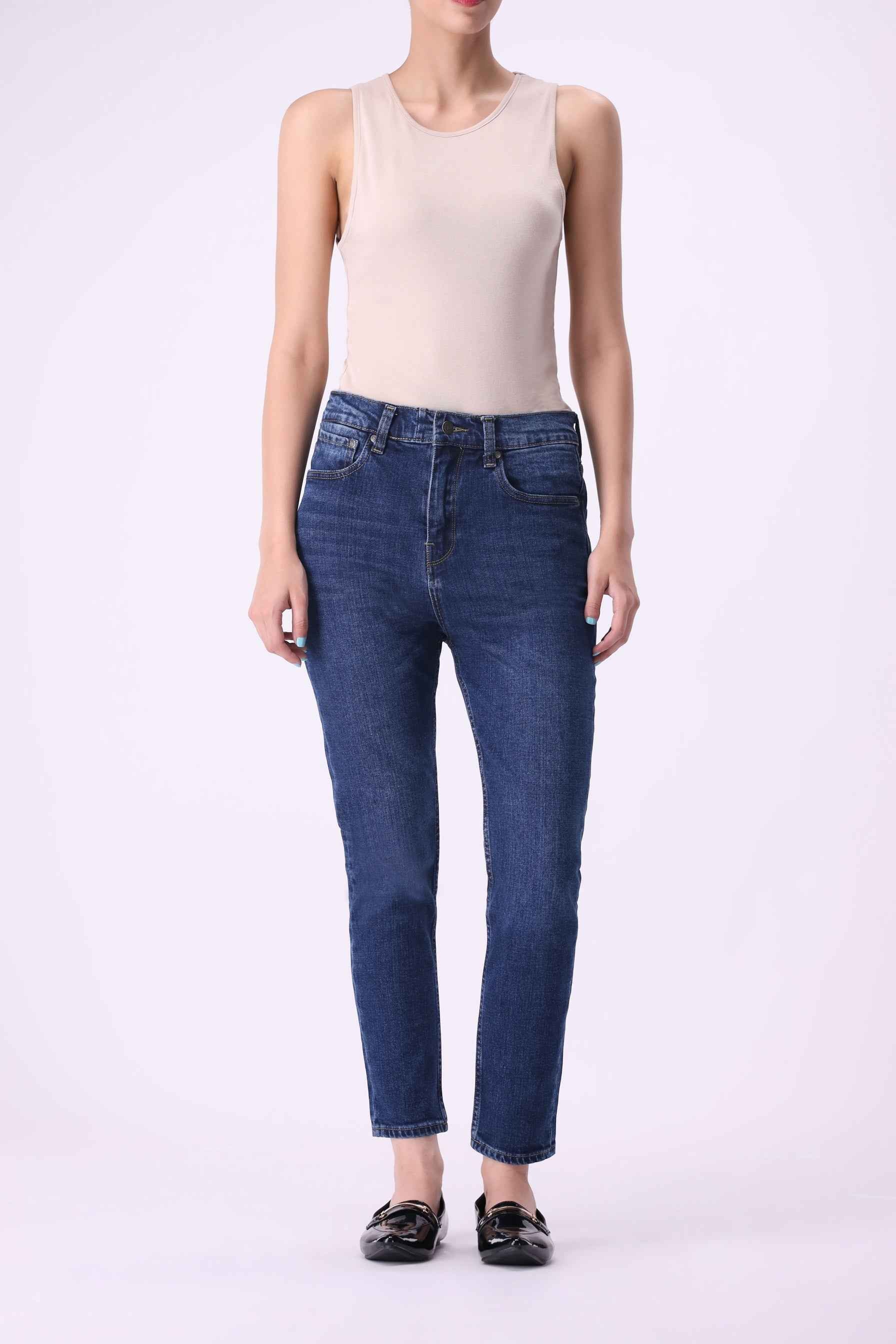 Beryoza women's high-rise skinny jeans in Mid Indigo wash, featuring 44% performance stretch and Tencel™ blend.