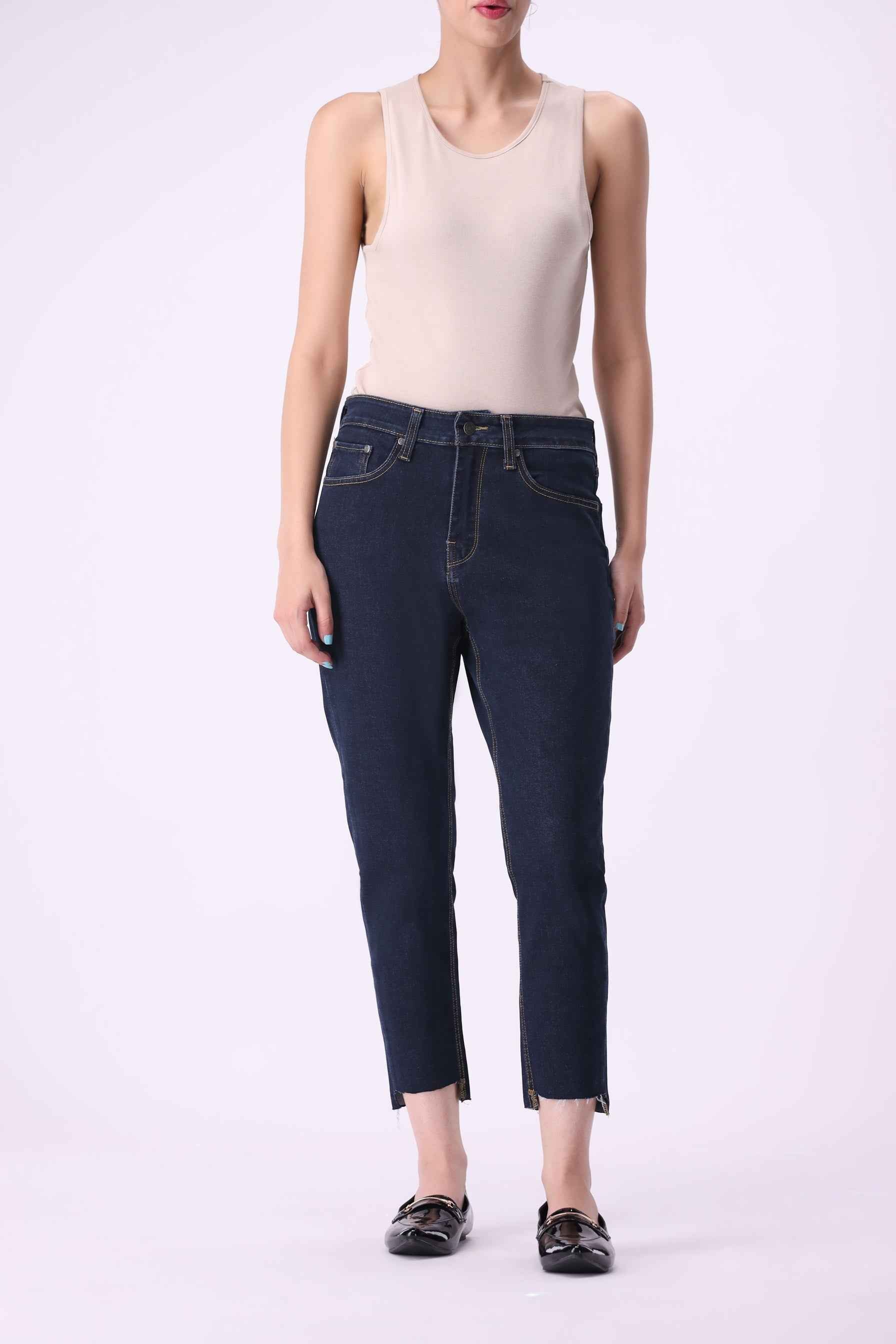 Birke women's high-rise ankle jeans in Dark Indigo, made with 50% organic and 49% BCI cotton.