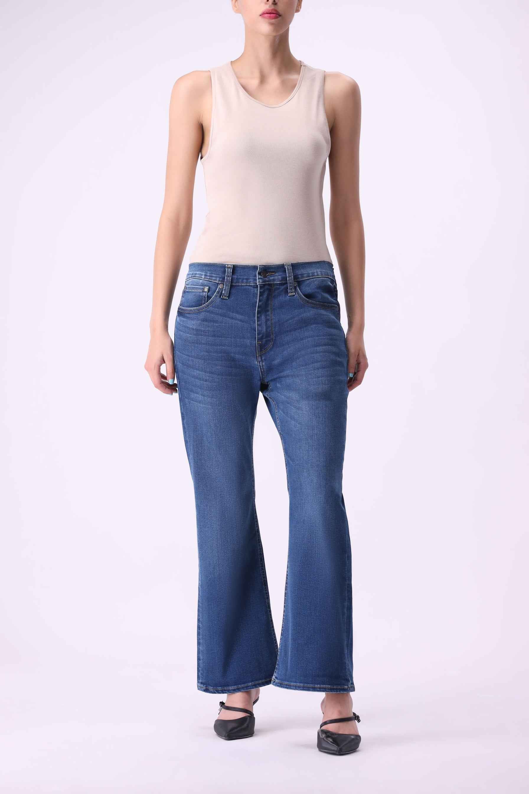 Canoe women's flare bootcut jeans in a premium indigo wash, featuring 75% organic and 25% recycled cotton.