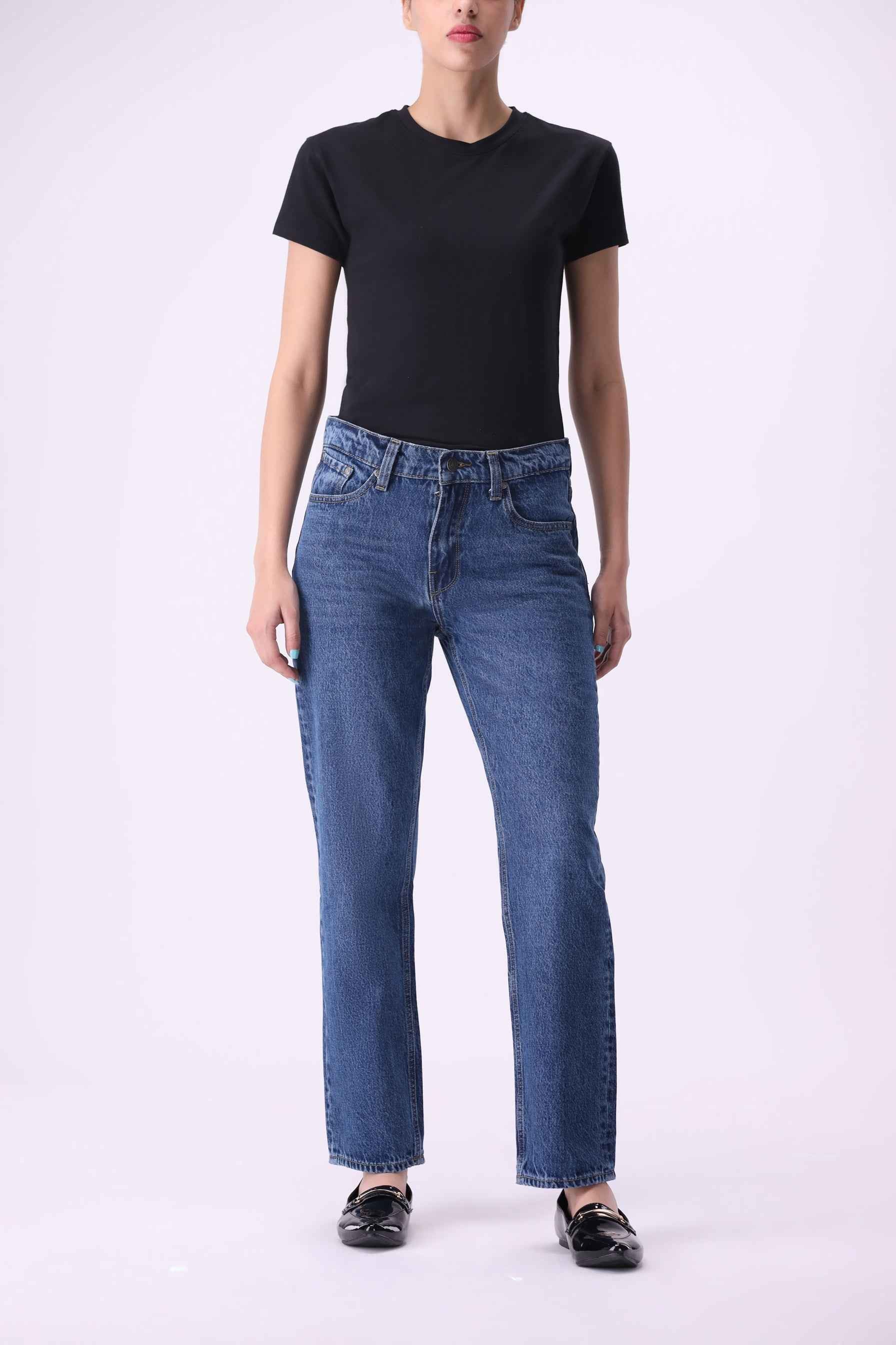 Koivu women's tapered slim boyfriend jeans in Mid Indigo wash, made with 75% organic and 25% recycled cotton.