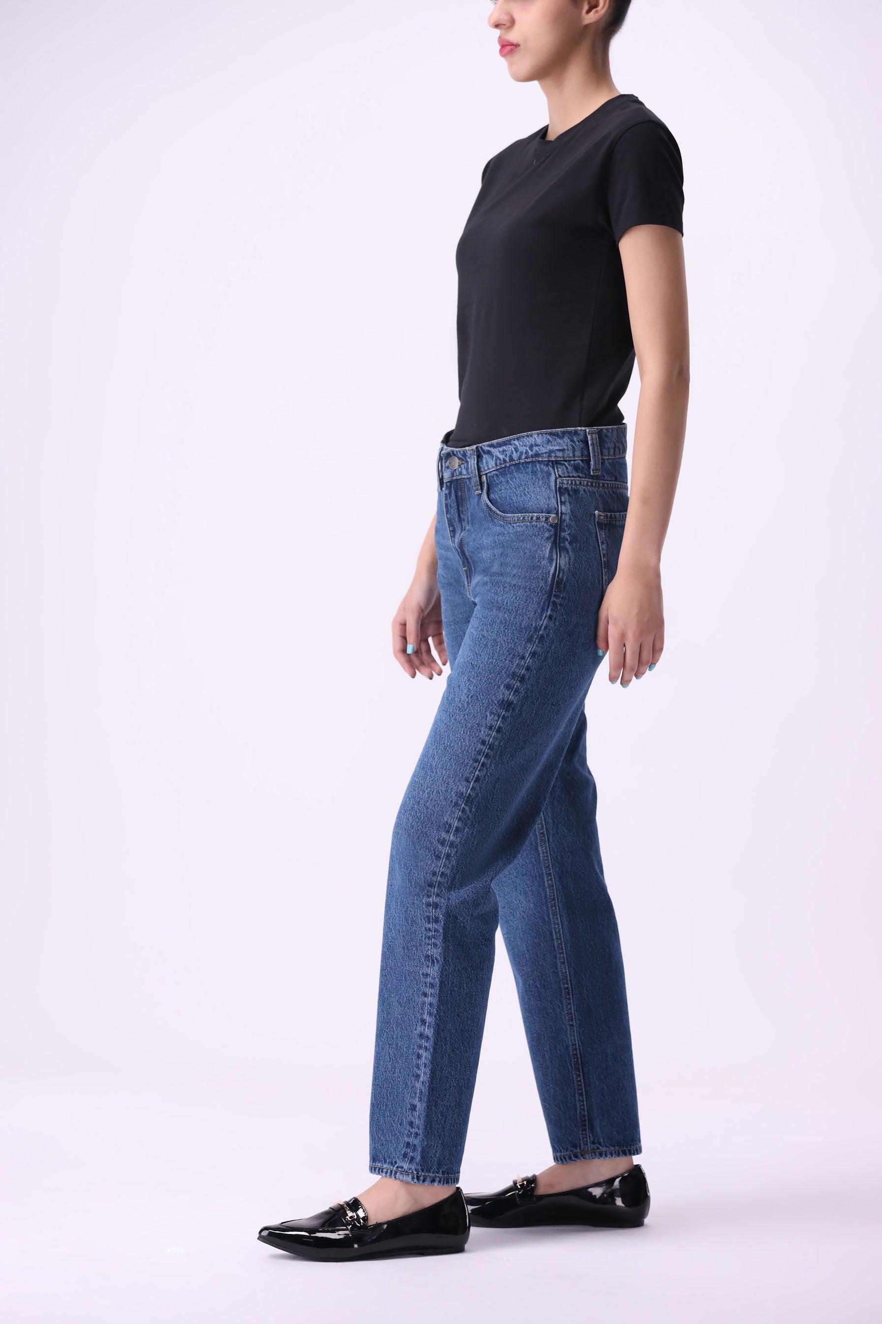 Side view of Bear & Birches Koivu women’s mid-rise slim straight jeans in medium blue wash