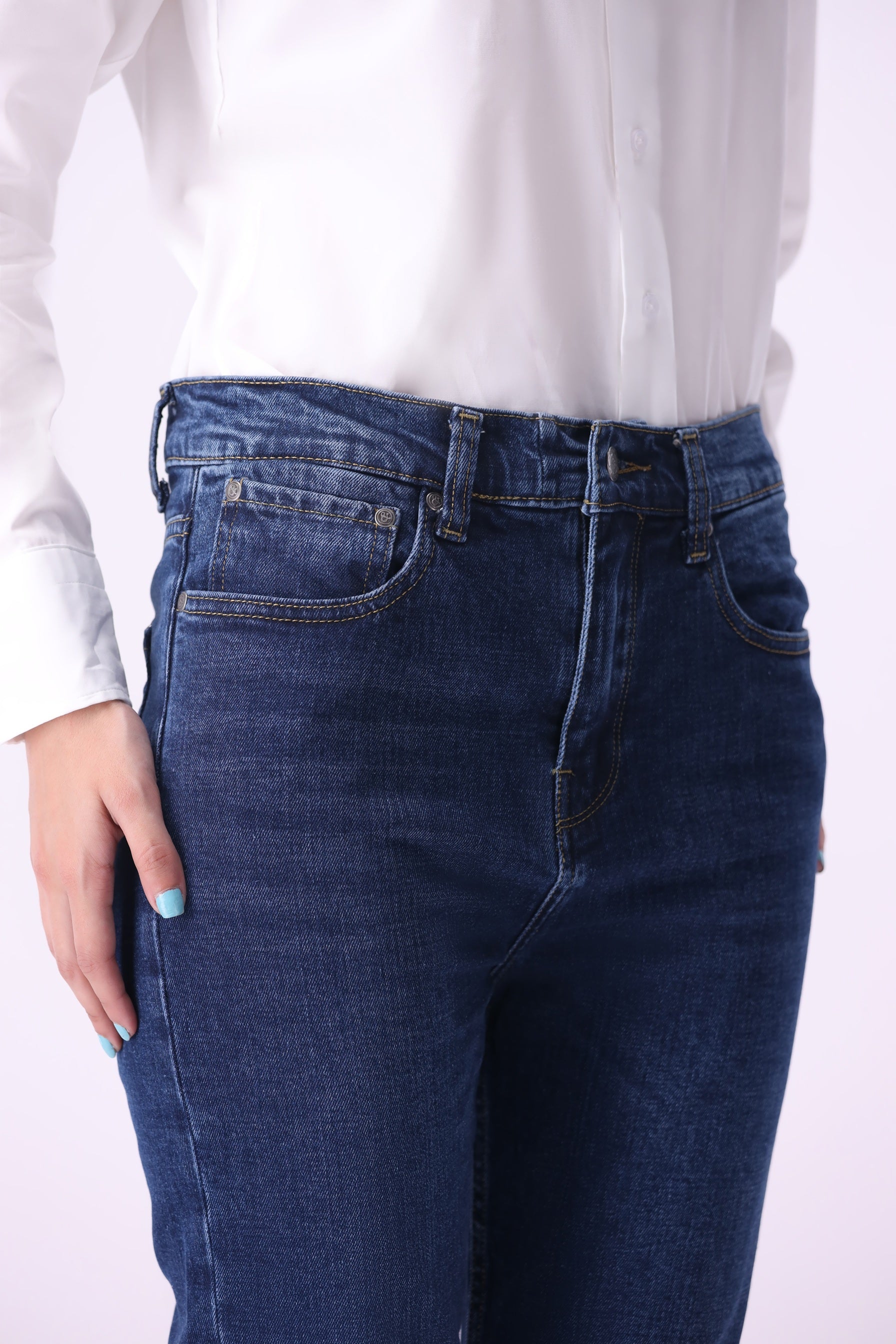 Close-up of women’s Shirikaba high-rise boyfriend jeans in dark indigo with slight stretch.
