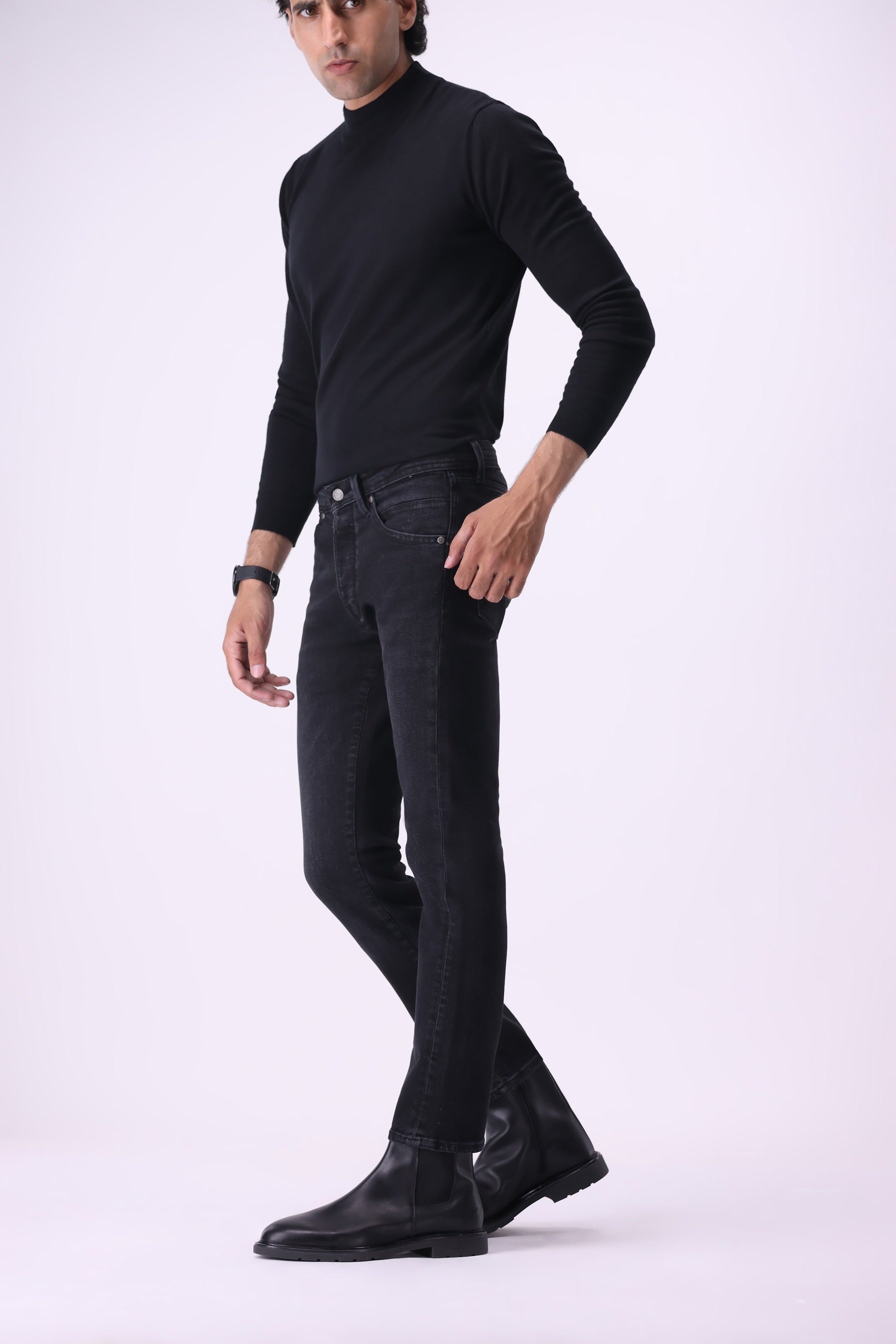 Atlas men’s athletic-fit jeans styled in timeless black sustainable denim