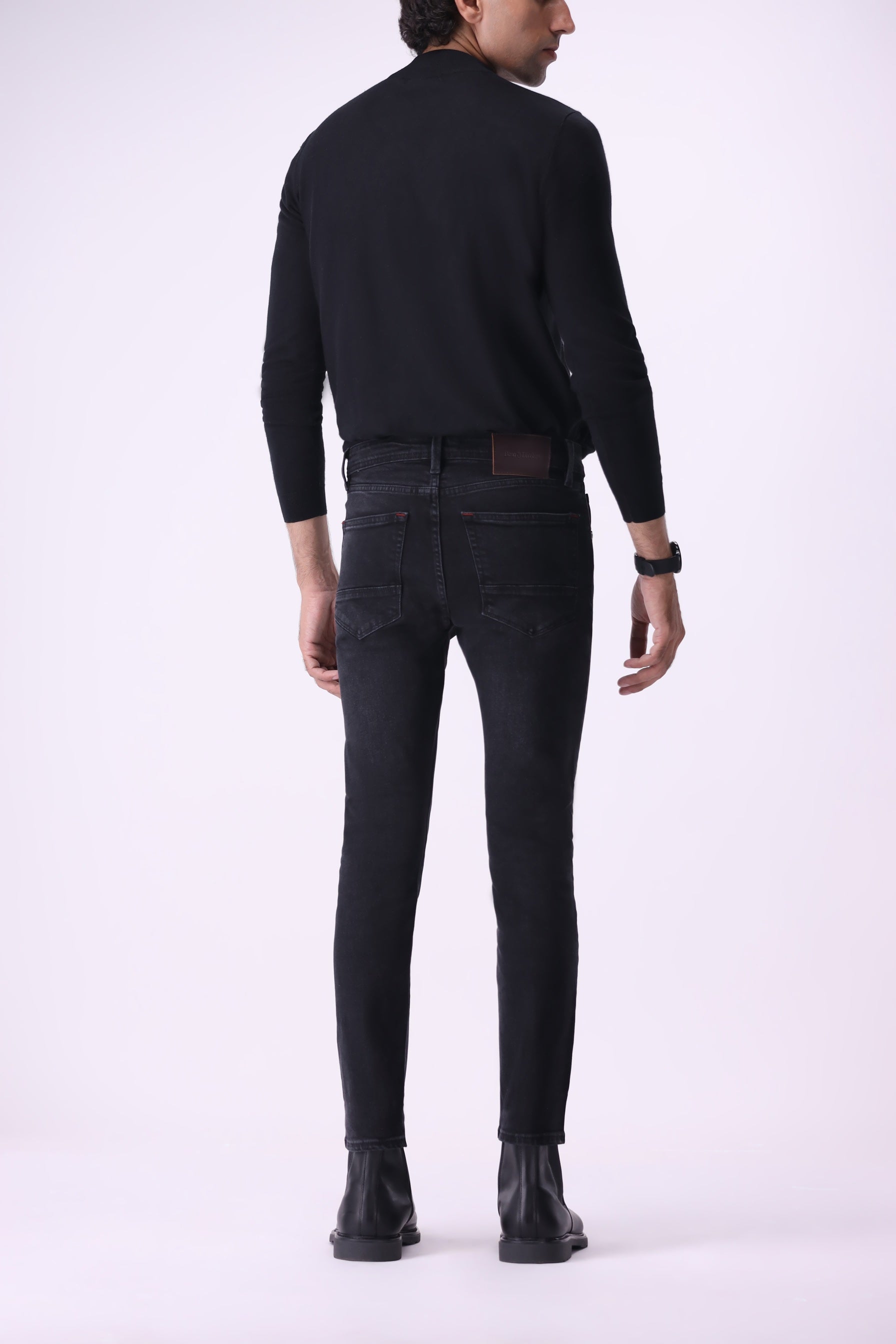 Men’s athletic-fit black jeans back view – Atlas sustainable denim