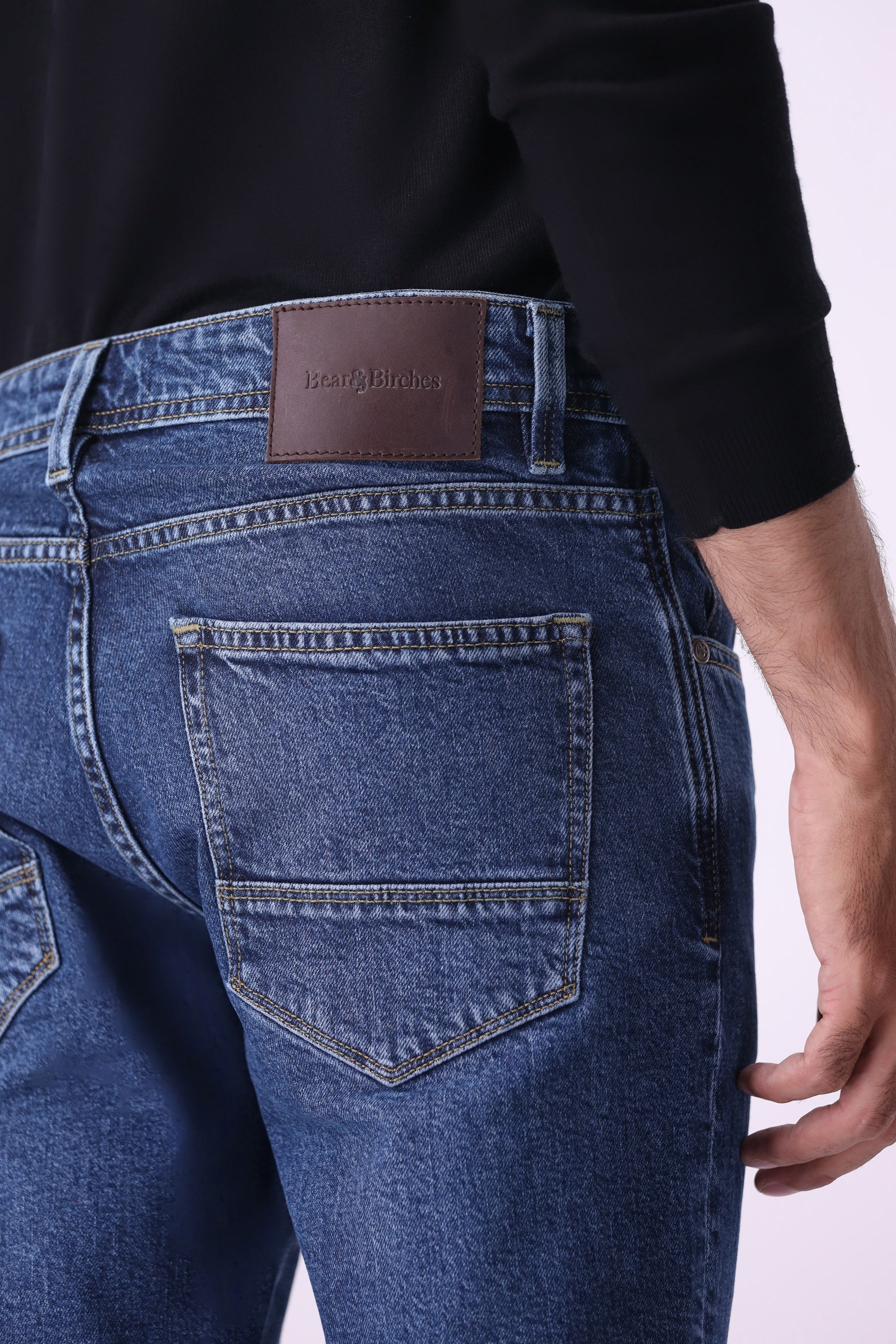 Dark indigo sustainable denim detail – Benji men’s relaxed-fit jeans