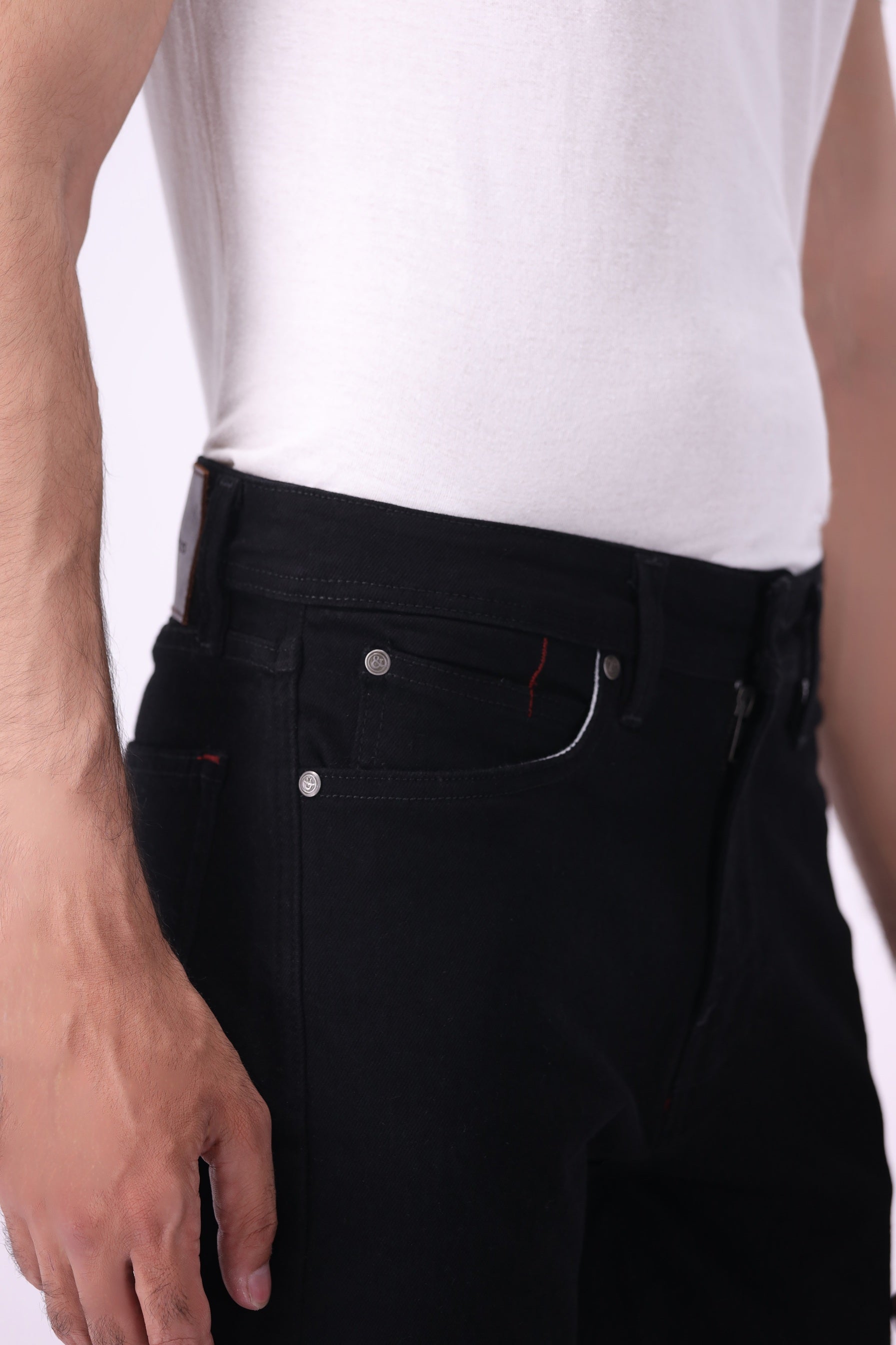 Men’s Medved slim black jeans, deep black sustainable denim, side profile